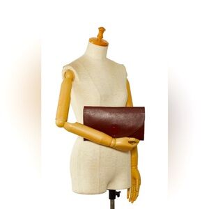 Authentic Cartier Burgundy Leather Must de Cartier Clutch Bag